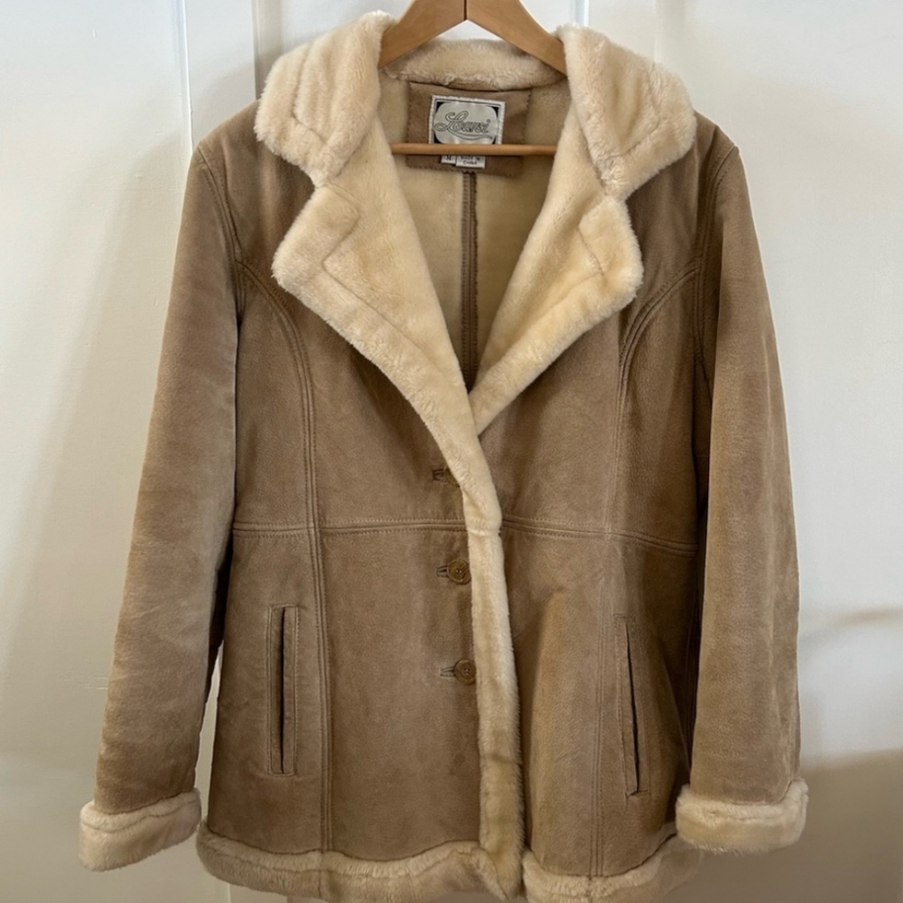 Vintage leather suede with soft faux fur lining.